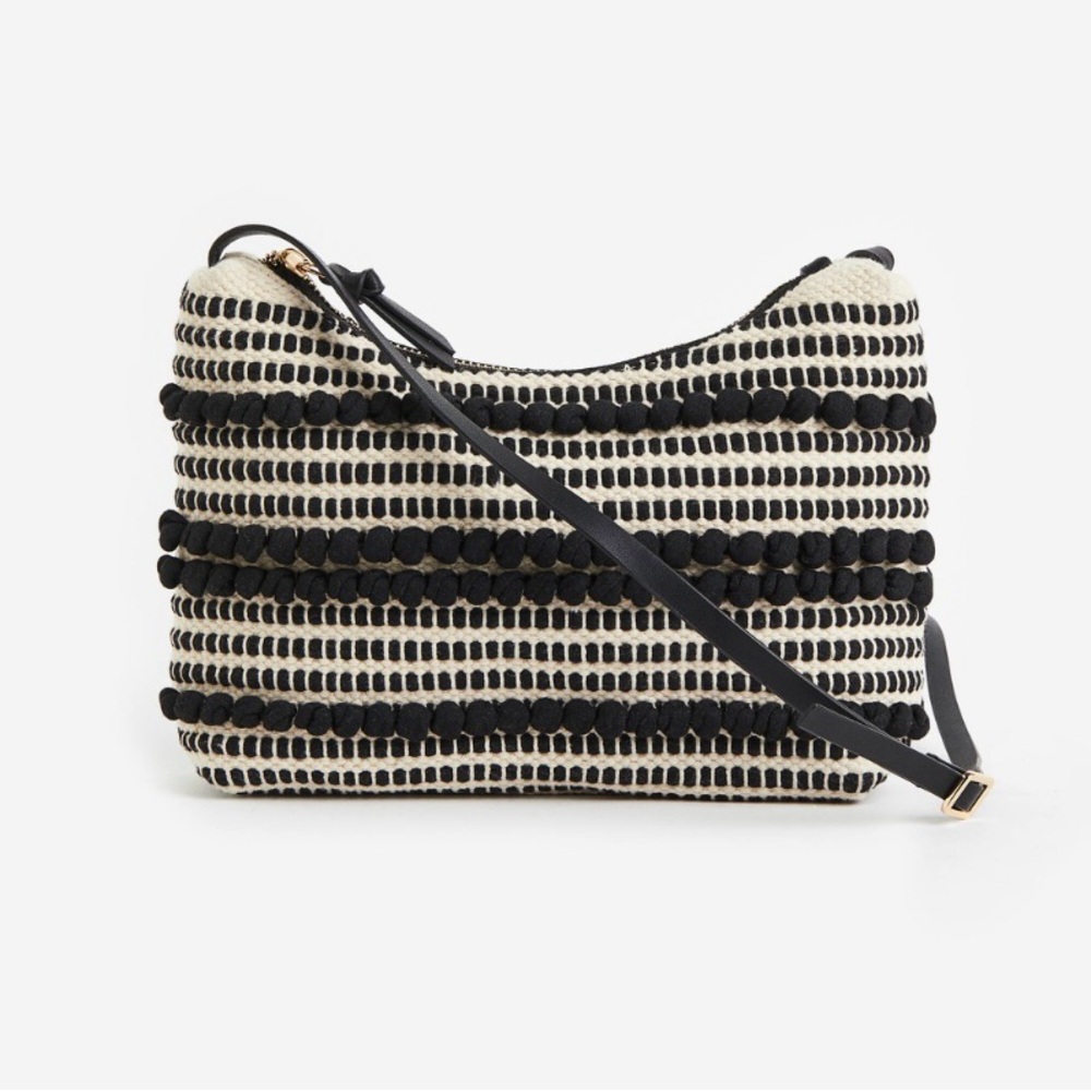 H&M Retro chic Shoulder Bag black & cream striped, textured weave black pom-pom